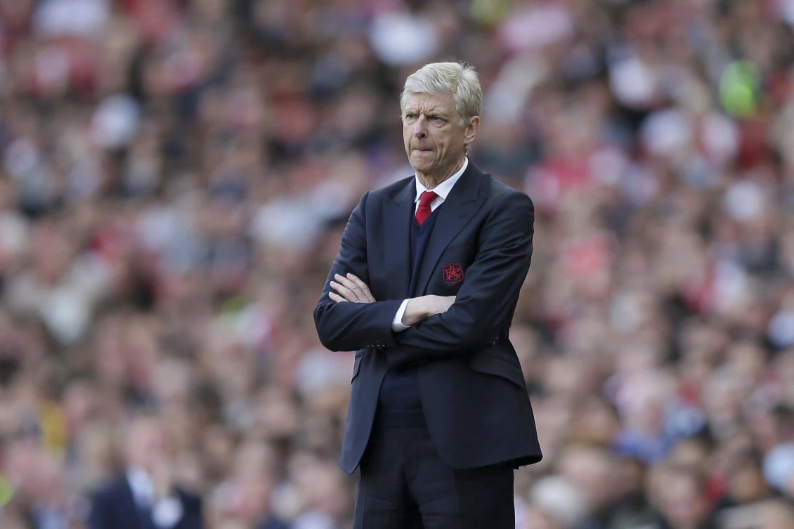 Arsenal manager Arsene Wenger looks across the pitch during the English Premier League soccer match between Arsenal and Everton at The Emirates stadium in London Sunday. (AP)