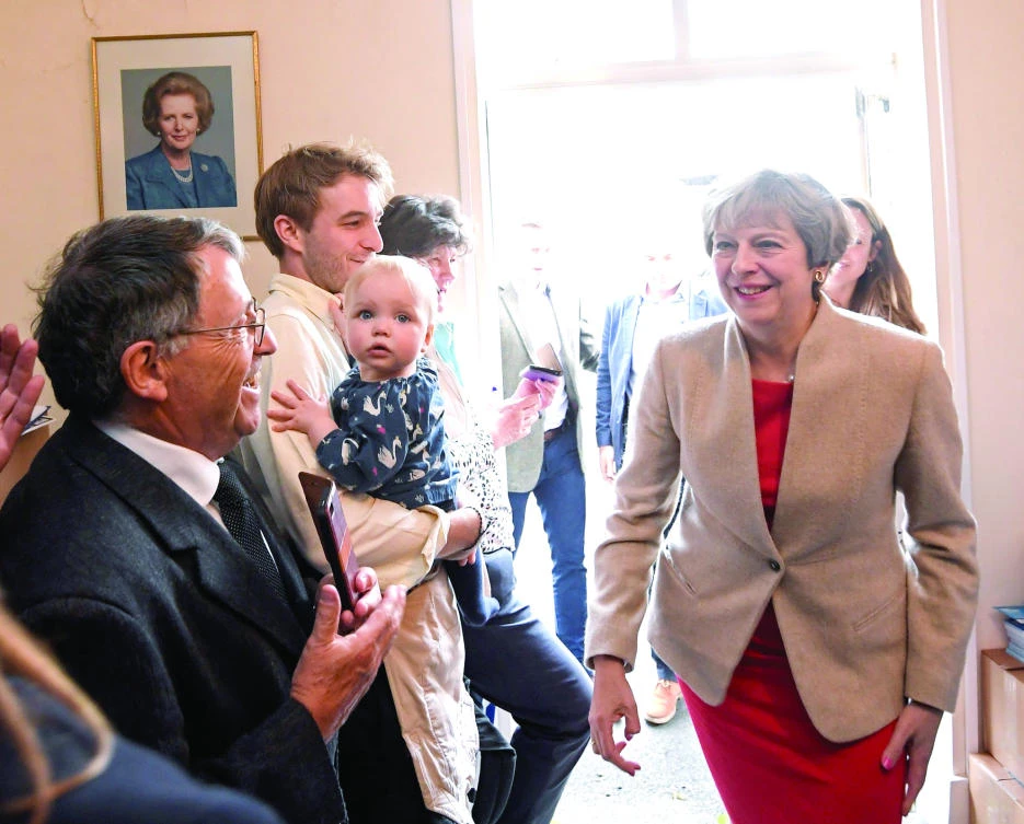 British Prime Minister Theresa May arrives to give a speech at the Ealing Conservative Association in London recently. (AFP)