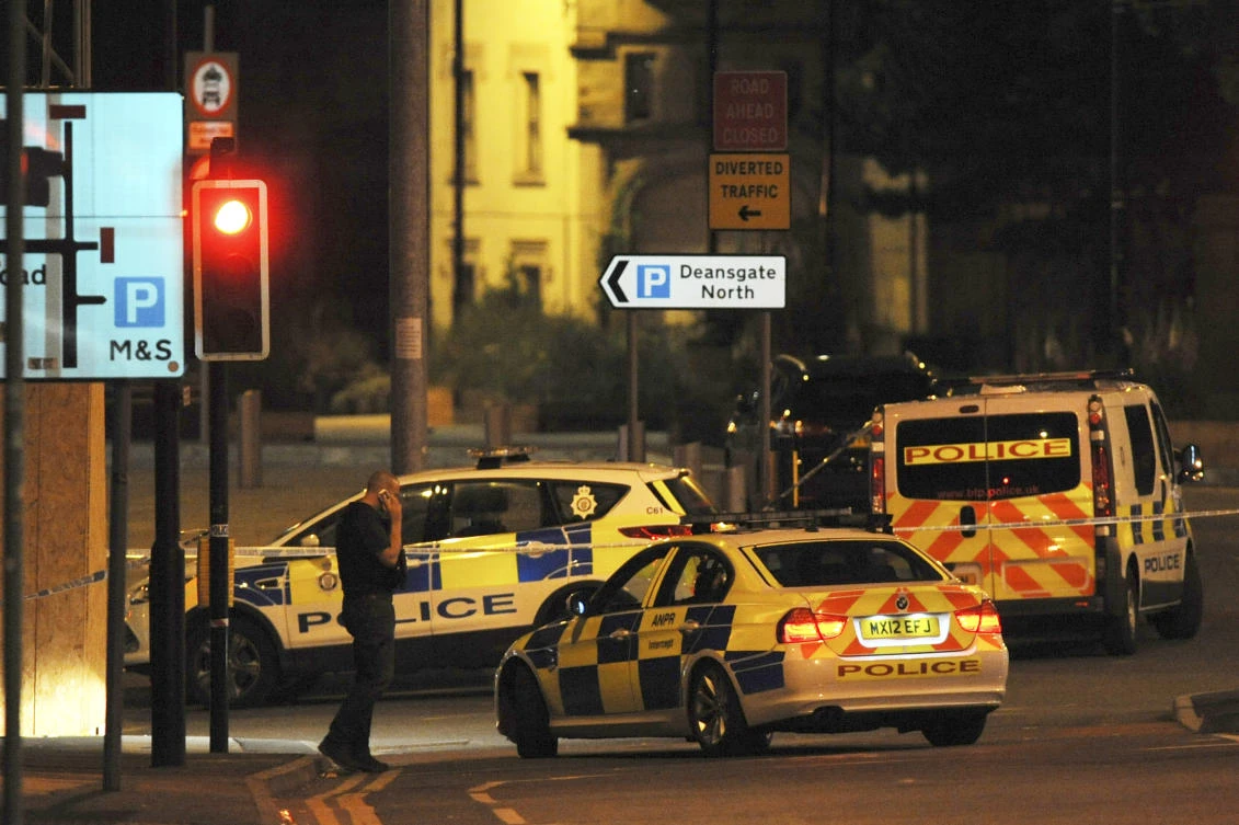 An explosion struck an Ariana Grande concert in northern England late Monday, killing over a dozen people and injuring dozens in what police say they are treating as a terrorist attack. (AP)