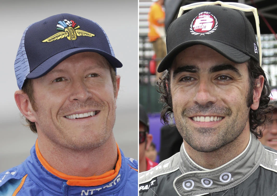 Police say Indianapolis 500 pole-sitter Scott Dixon, left, and fellow former race winner Dario Franchitti were robbed at gunpoint while in a Taco Bell drive-thru lane Sunday night, less than a mile from the Indianapolis Motor Speedway, where Dixon had hours earlier won the top starting position for next Sunday's Indy 500. (AP)