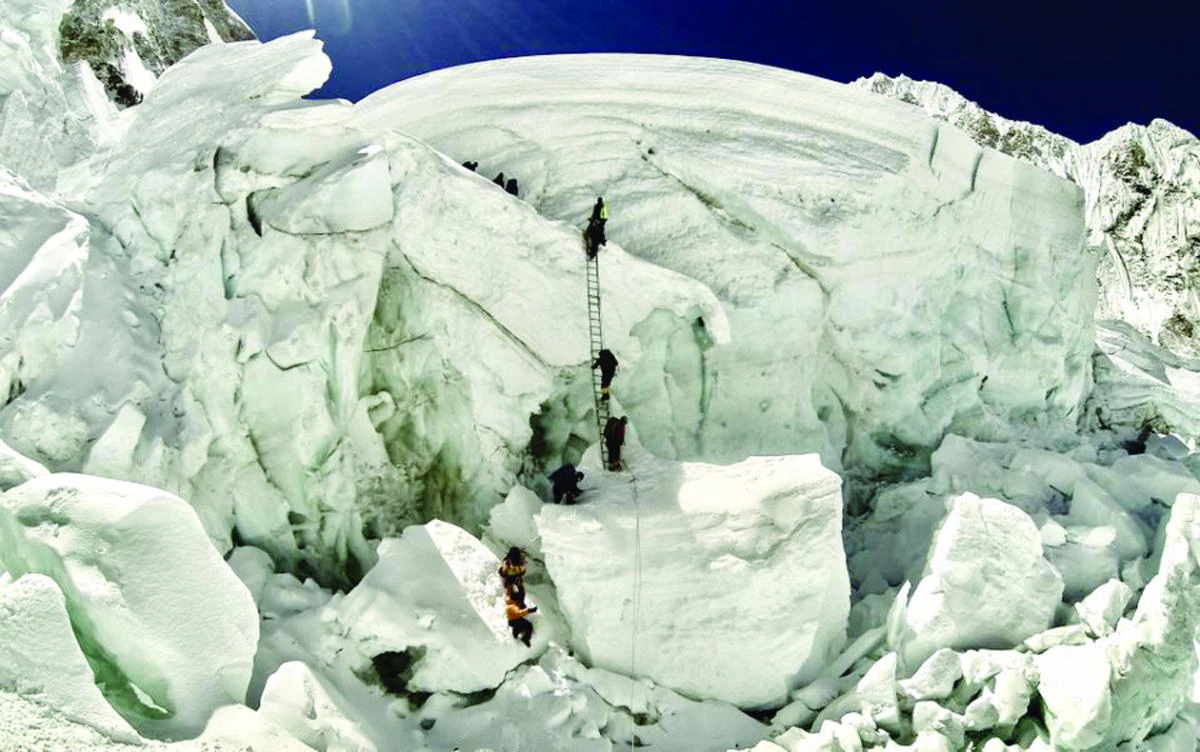 Climbers use ladders to ascend the Nepalese side of Mount Everest. (AFP)