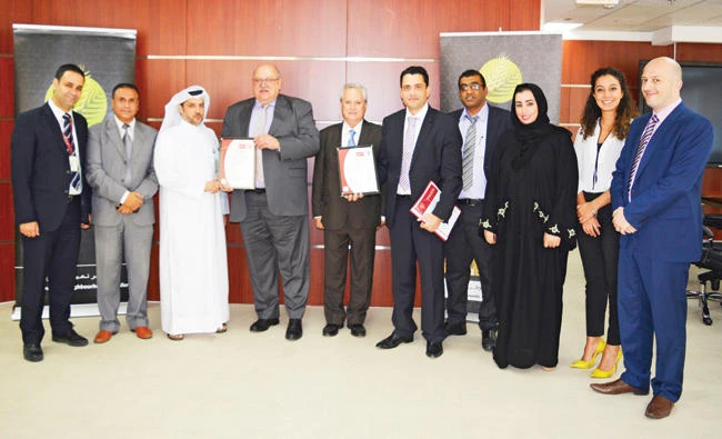 Bureau Veritas Country Chief Executive Salim Kseib presented the award to Al-Meera Acting CEO Cobus Lombard, Commercial and Acting Supply Chain Director Karim Noui, and other senior officials at Al Meera.