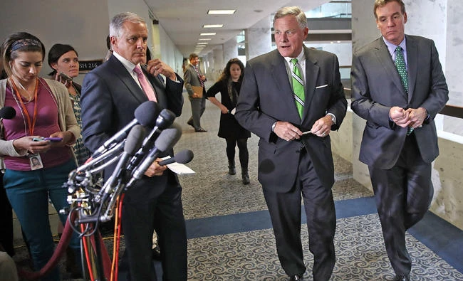 Sen. Richard Burr, Chairman of the US Senate Select Committee on Intelligence, and ranking member of the committee arrive to speak with reporters after a meeting of the committee on Capitol Hill on May 23, 2017 in Washington, DC. (Win McNamee/Getty Images/AFP)