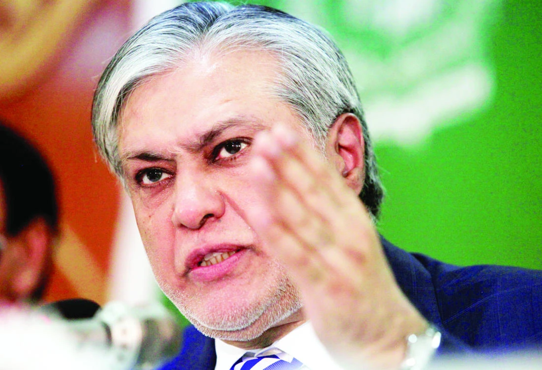 Pakistan's Finance Minister Ishaq Dar gestures during a news conference in Islamabad on Thursday. (Reuters)