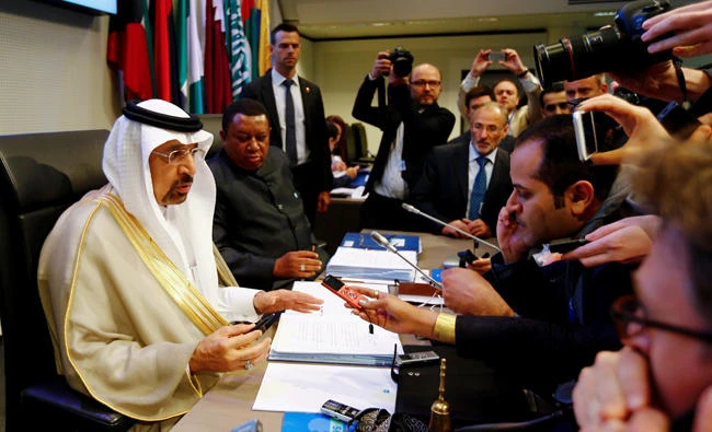 Energy Minister Khalid Al-Falih OPEC Secretary General Mohammad Barkindo talk to journalists in Vienna, Austria. (Reuters)