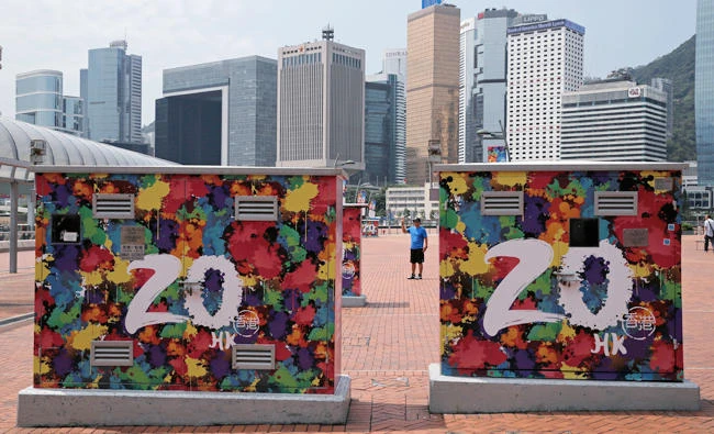 Decorative posters are seen in Hong Kong to celebrate the 20th anniversary of Hong Kong’s handover from Britain to China on July 1. (AP)