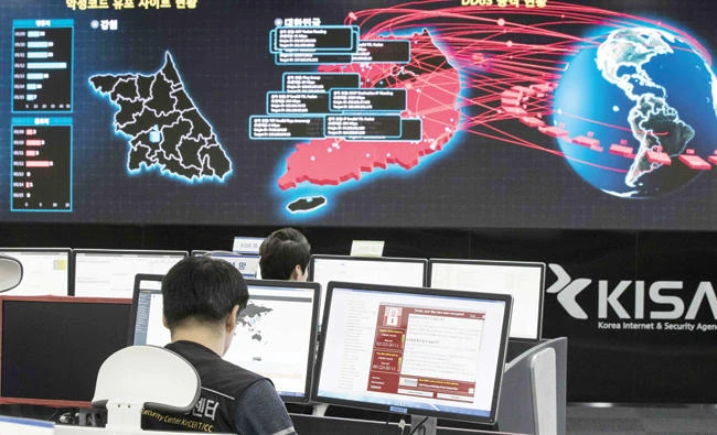 Employees monitor the spread of ransomware cyber-attacks at South Korea's Internet and Security Agency in Seoul. (AFP)