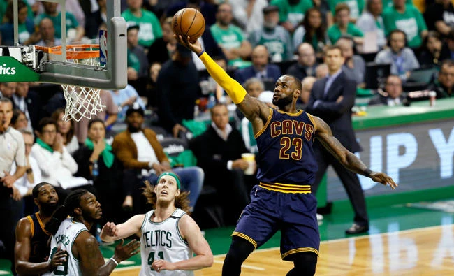 Cleveland Cavaliers forward LeBron James (23) attempts a layup against the Boston Celtics during the third quarter of game five of the Eastern conference finals of the NBA Playoffs at the TD Garden. (Greg M. Cooper-USA TODAY Sports)