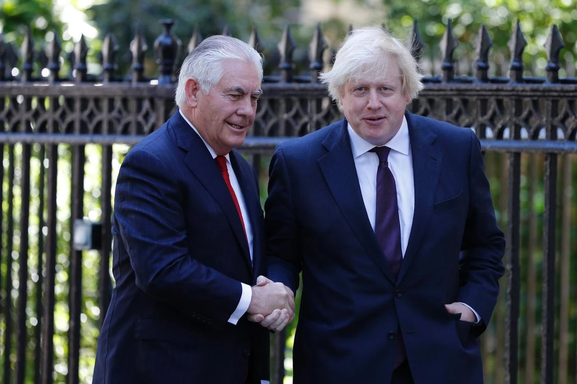 Britain's Foreign Secretary Boris Johnson (R) greets US secretary of state Rex Tillerson. (AFP)