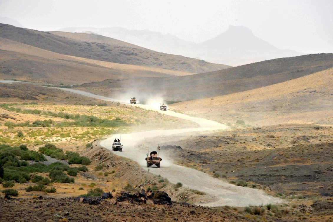 Afghan National Army (ANA) soldiers patrol the Shah Wali Kot district of Kandahar province. (AFP)