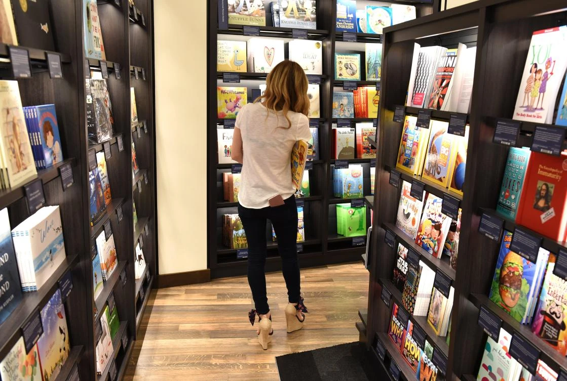 Customers arrive at Amazon Books in Manhattan's Time Warner Center on May 25, 2017 as the online retailing giant Amazon.com Inc. opens its first New York City bookstore. (AFP)