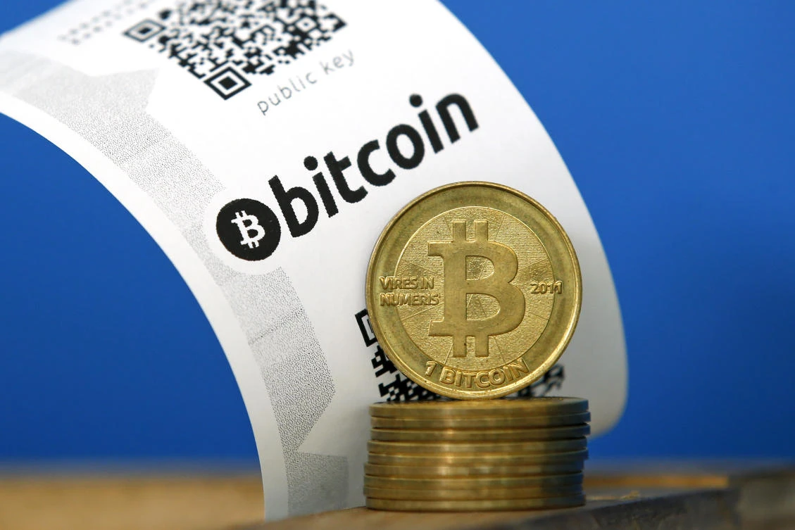 The average person can easily purchase and trade bitcoins through an online trading platform such as Coinbase using their normal debit or credit card, meaning real money can flood into the currency very quickly. (Reuters)