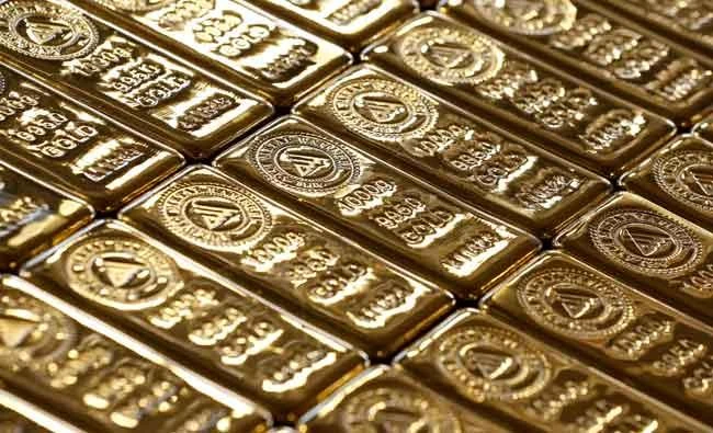 Gold at highest since May 1 on political uncertainty, dollar