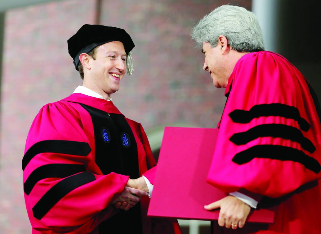 Facebook founder Mark Zuckerberg accepts an honorary degree at Harvard University in Massachusetts. (Reuters)
