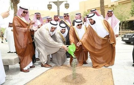Riyadh Gov. Prince Faisal bin Bandar waters a plant after inaugurating the plantation campaign in Riyadh on Thursday.