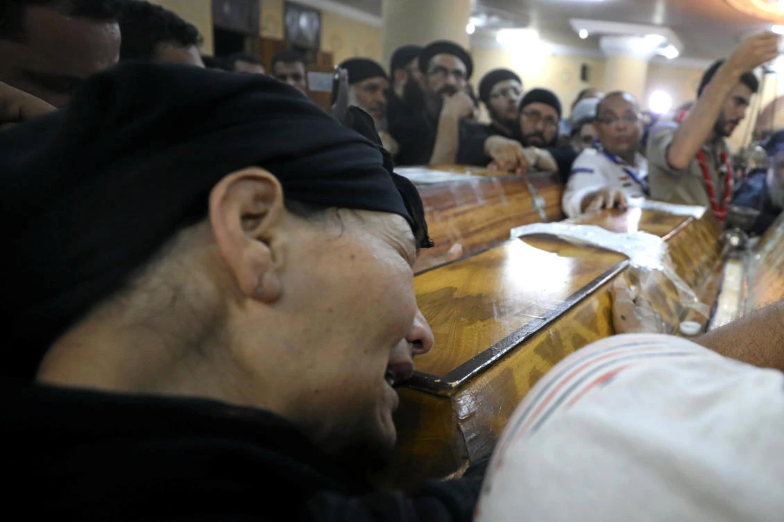 Mourners gather at the Sacred Family Church for the funeral of Coptic Christians who were killed on Friday in Minya, Egypt. (Reuters)