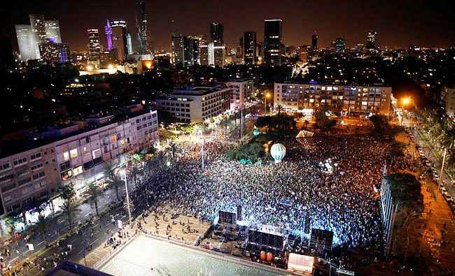 People take part in a demonstration held by Israeli left-wing group Peace Now, entitled "Two States, One Hope, A demonstration against 50 years of occupation", in Tel Aviv, Israel on Sunday. (REUTERS)
