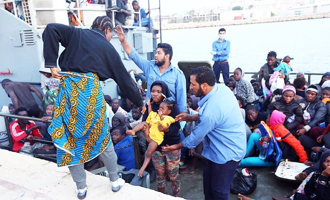 Illegal immigrants, who were rescued by the Libyan coastguard in the Mediterranean off the Libyan coast, arrive at a naval base in the capital Tripoli, in this May 26, 2017 photo. (AFP)