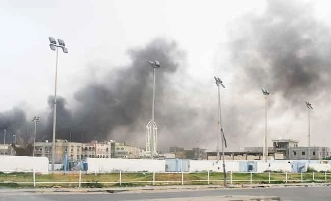 Smoke rises during heavy clashes between rival factions in Tripoli, Libya, on Saturday. (REUTERS)