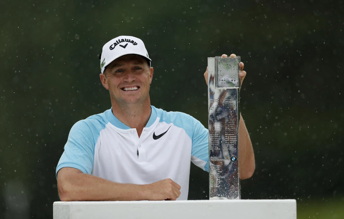 Sweden's Alex Noren with the trophy after winning the BMW PGA Championship on Sunday at Wentworth Club, Virginia Water, Surrey, England. (Reuters)