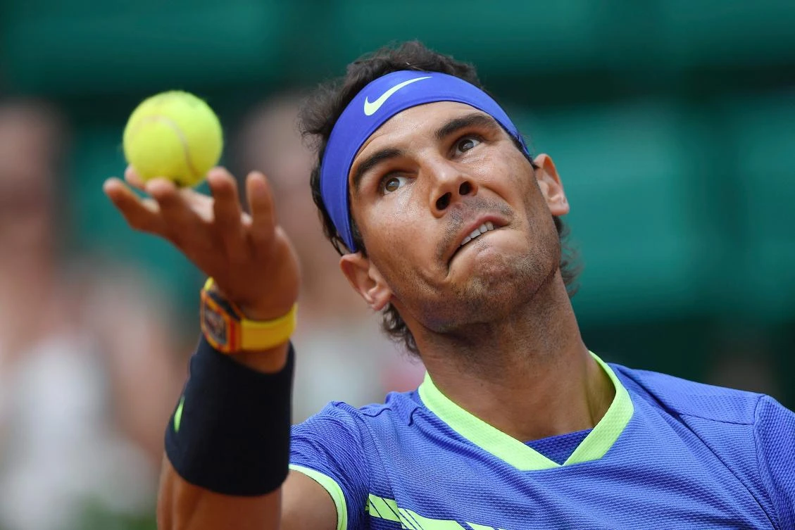 Spain's Rafael Nadal serves to France's Benoit Paire during their tennis match at the Roland Garros 2017 French Open on Monday in Paris. (AFP)