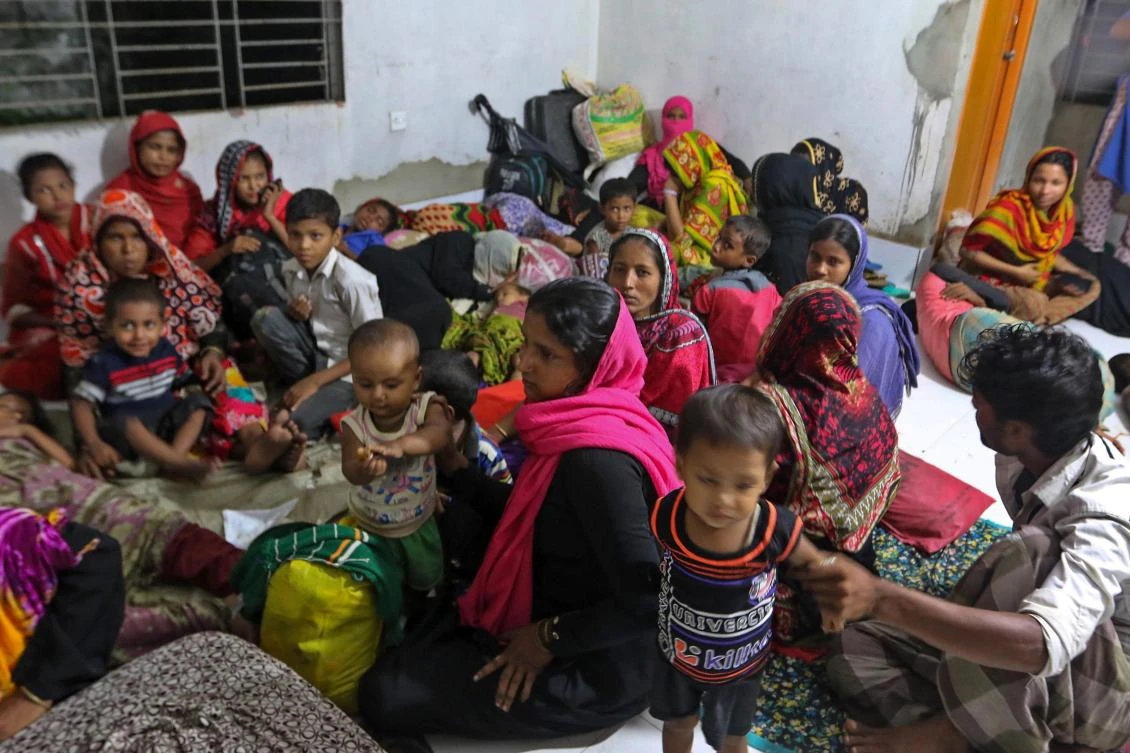 Bangladeshi villagers take refuge in a cyclone shelter following an evacuation by authorities in the coastal villages of the Cox's Bazar district on May 29, 2017 as Cyclone 'Mora' gradually approaches towards the coastline. (AFP)