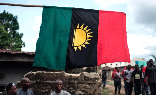 Supporters of the Indigenous People of Biafra (IPOB) hold a march through the Osusu district in Aba on Sunday. (AFP)