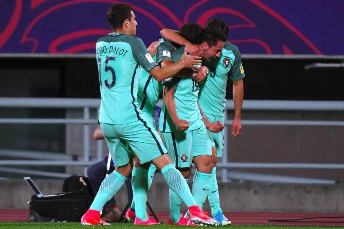 Portugal's Bruno Costa, center, celebrates his goal with teammates during their U-20 World Cup round of 16 football match between South Korea and Portugal in Cheonan on Tuesday. (AFP)