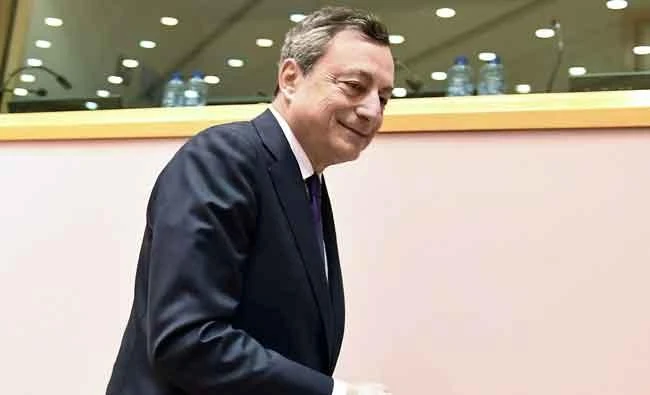European Central Bank (ECB) President Mario Draghi arrives to deliver a speech during a meeting of the Committee on economic and monetary affairs (ECON) at the European Parliament, in Brussels, on Monday. (AFP)