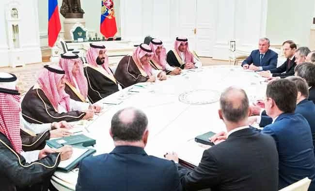Russian President Vladimir Putin (R) meets with Saudi Deputy Crown Prince and Defence Minister Mohammed bin Salman (5th L) during a meeting at the Kremlin in Moscow on Tuesday. (AFP)