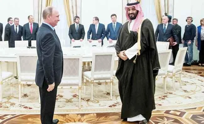 Russian President Vladimir Putin welcomes Saudi Deputy Crown Prince Mohammed bin Salman during a meeting at the Kremlin in Moscow. Tuesday (Reuters)