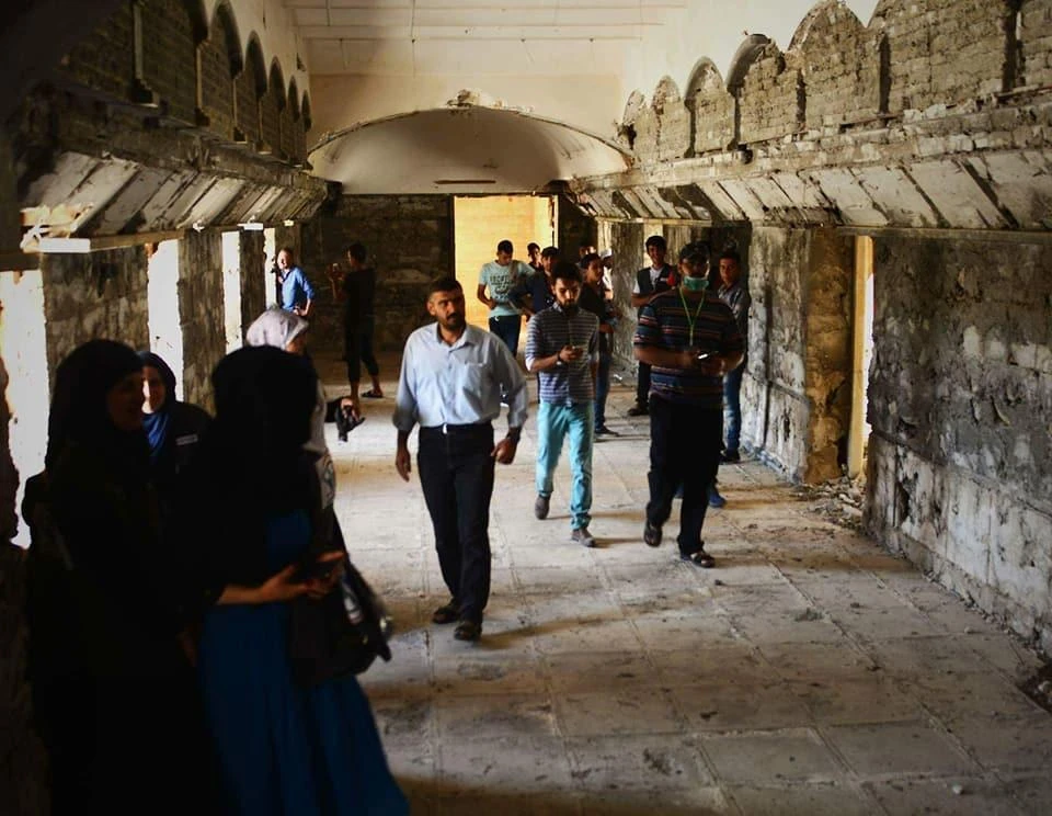 Muslims residents repairing destroyed church. (Photo curtesy: Facebook/This is Christian Iraq)