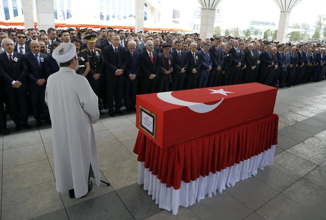 Turkish leaders, army commanders and family members attend funeral prayers for army general Aydogan Aydin, one of 13 army officers who were killed in a helicopter crash in Sirnak, late Wednesday, in Ankara, Turkey, Thursday, June 1, 2017. Turkey's military killed 13 Kurdish militants in the northern Iraq. (AP)