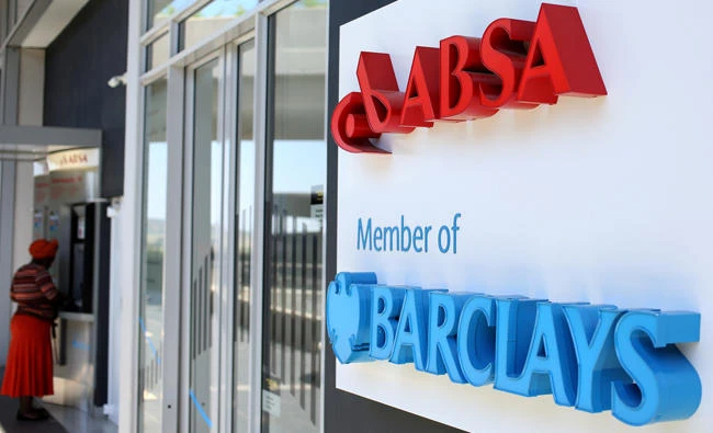 A women uses an ATM at a branch of Barclay's South African subsidiary Absa bank in Johannesburg last year. (Reuters)