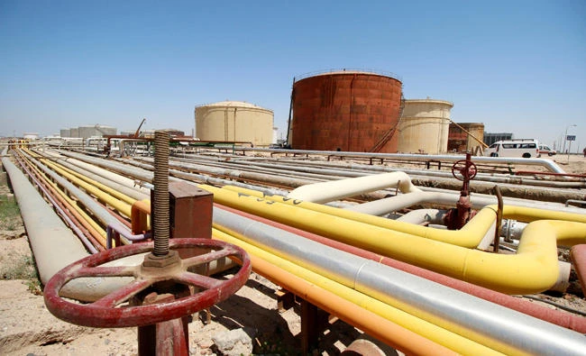 Oil exporters are trying to restrict output to drain stockpiles that are close to record highs in many parts of the world. (Reuters)