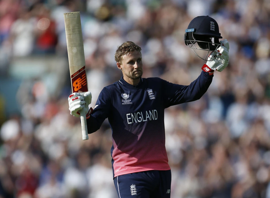 England's Joe Root celebrates his century. (Reuters)