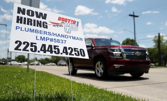Private US companies hired at a blistering pace in May, accelerating from the pause in April back to the trend of the past six months. (AFP)