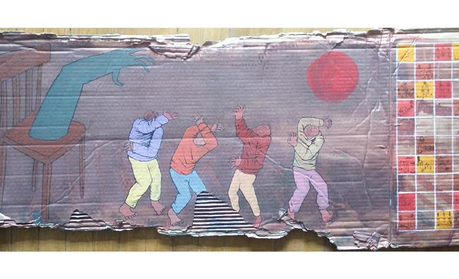 Egyptian artist Ali Abdel Mohsen, bottom right, works almost exclusively with cardboard, a Uniball pen and dominate orange paint.