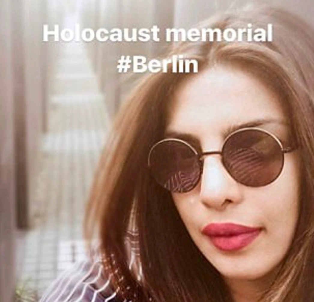 Snapchat image of Priyanka Chopra posing infant of the Holocaust memorial