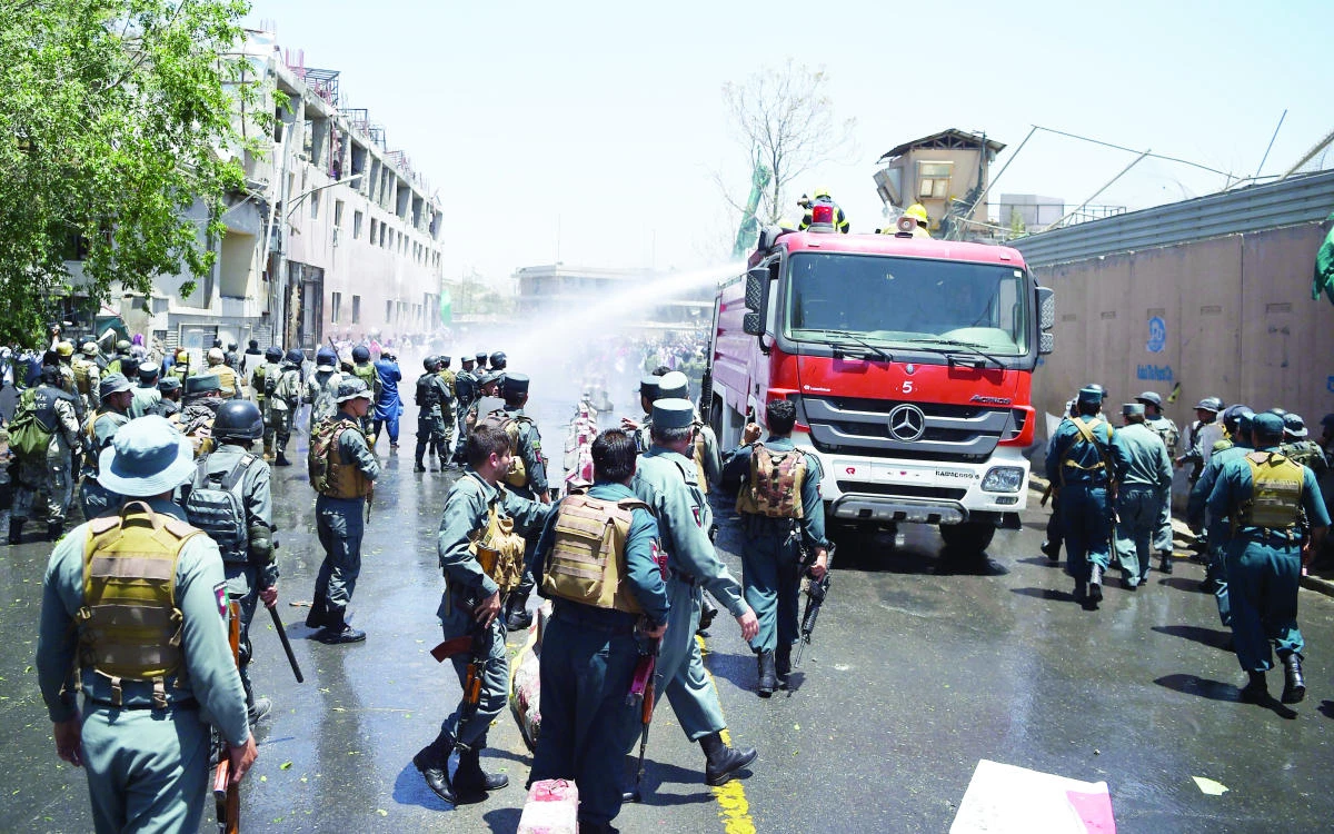 Afghan security forces use water canons to disperse protesters during Friday’s clashes in Kabul. (AFP)