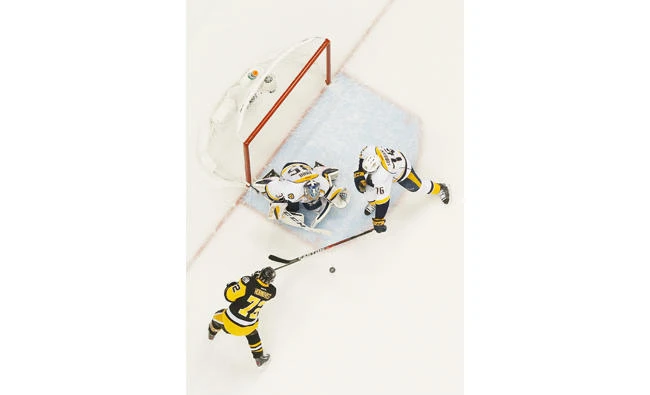 Pekka Rinne #35 and P.K. Subban #76 of the Nashville Predators defend against Patric Hornqvist #72 of the Pittsburgh Penguins in Game Two of the 2017 NHL Stanley Cup Final in Pittsburgh, Pennsylvania on Wednesday. (AFP)