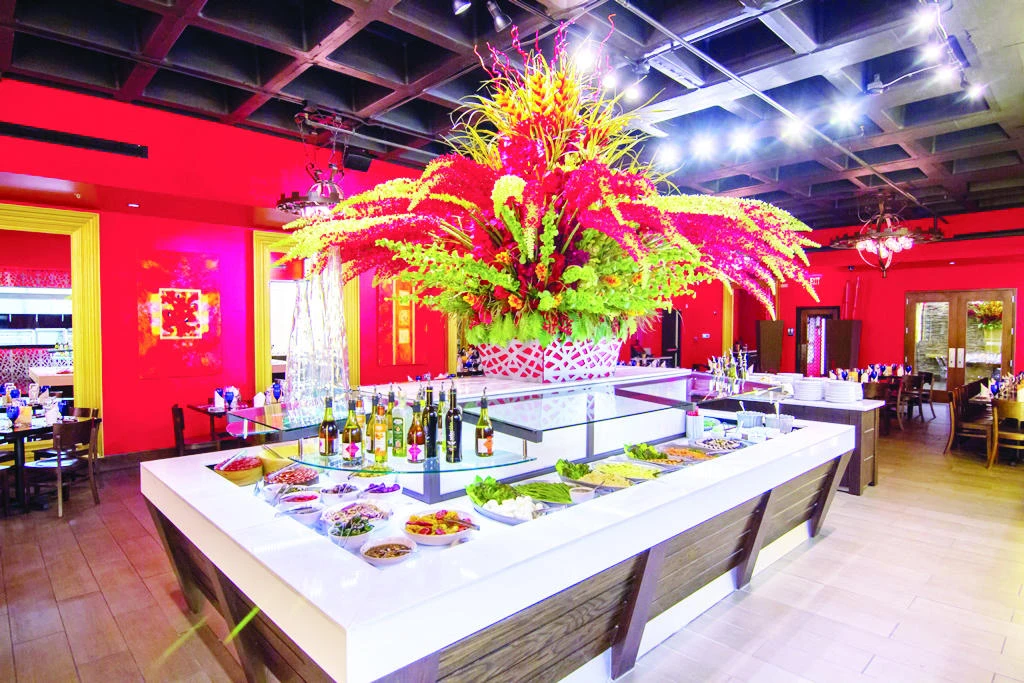 The steakhouse also boasts an elaborate salad area, decorated by large tropical flowers and featuring fresh gourmet items.