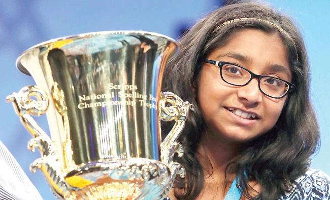 Ananya Vinay poses with her trophy after winning the final of the National Spelling Bee contest in National Harbor, Maryland. (AFP)