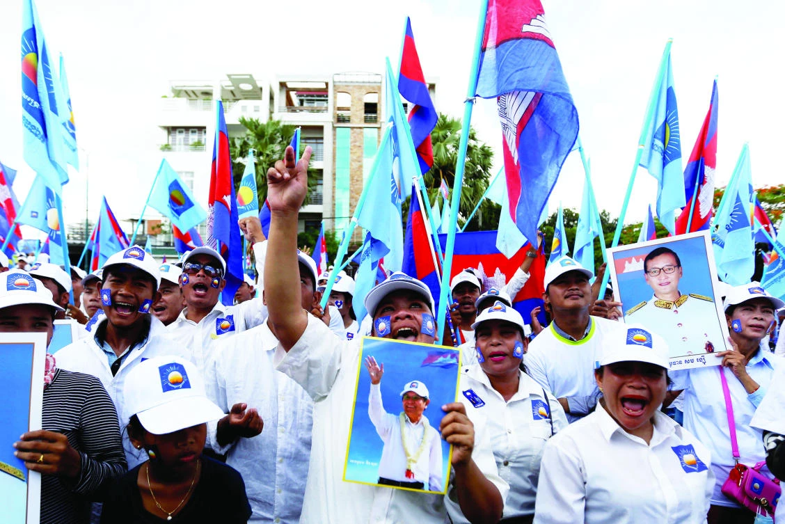 Supporters of the Cambodia National Rescue Party attend
a campaign rally in Phnom Penh on Friday. (Reuters)