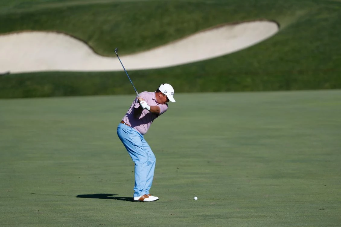 Jason Dufner hits his second shot on the 11th hole during the second round of the Memorial Tournament at Muirfield Village Golf Club on Friday in Dublin, Ohio. (AFP)