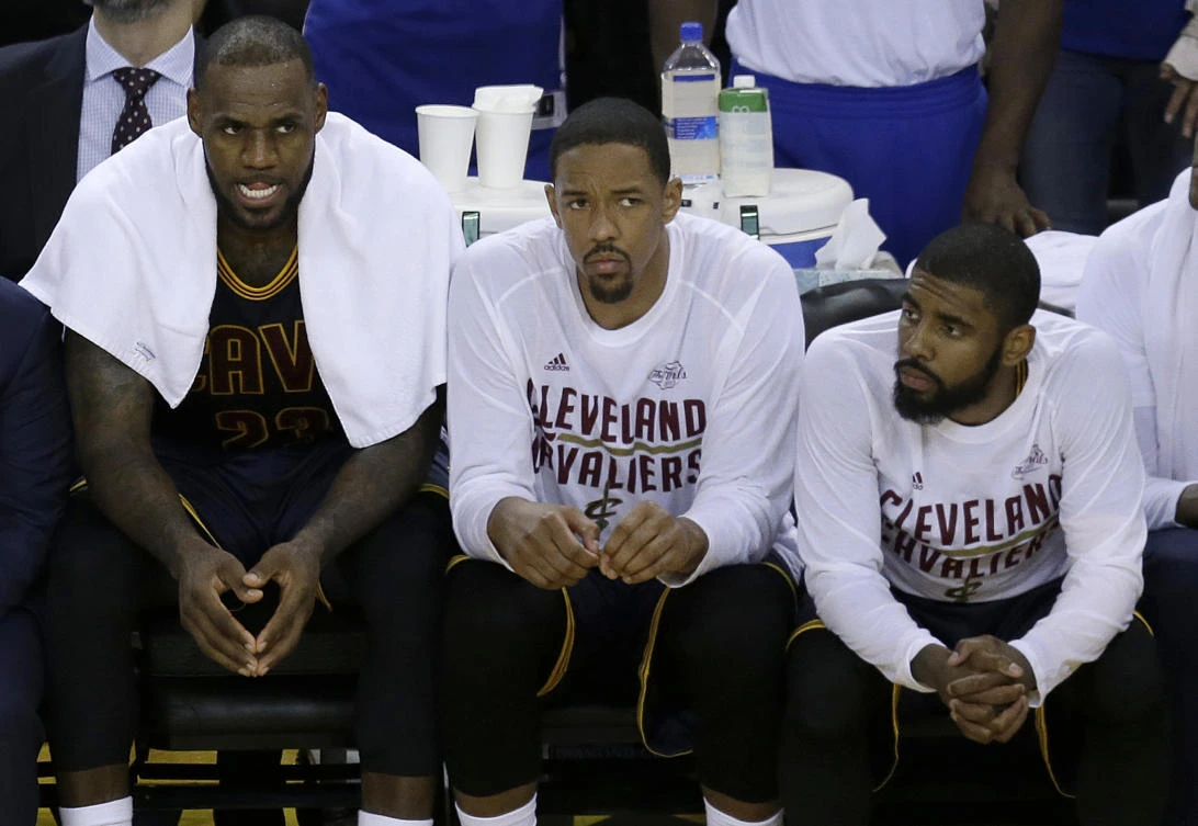 Cleveland Cavaliers forward LeBron James, from left, sits on the bench with center Tristan Thompson and guard Kyrie Irving during the second half of Game 1 of basketball's NBA Finals against the Golden State Warriors in Oakland, Calif., on Thursday. (AP)