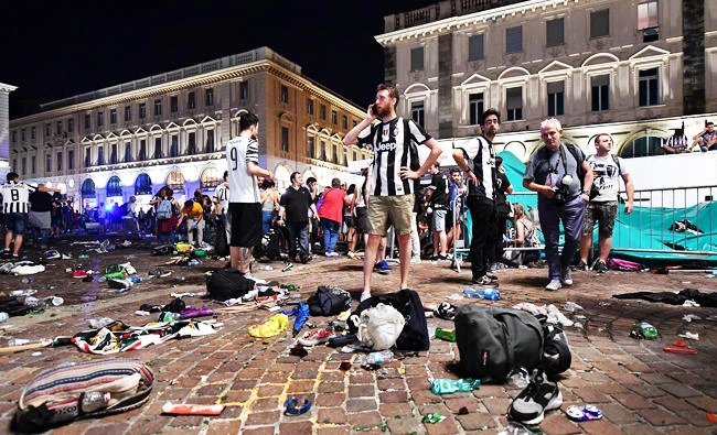 Juventus fans leave San Carlo's square at the end of the Champions League final soccer match between Juventus and Real Madrid, in Turin, Italy, on Saturday. (AP)