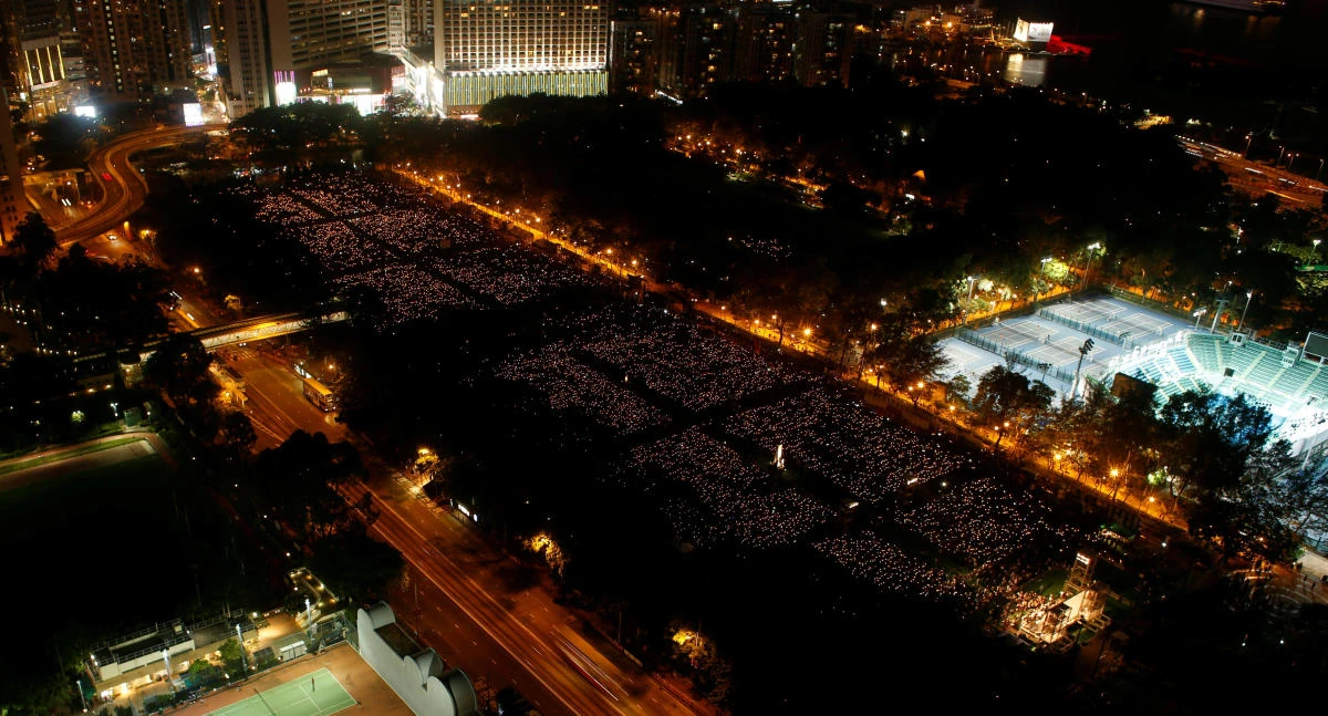 Thousands of people take part in a candlelight vigil to mark the 28th anniversary of the crackdown of pro-democracy movement at Beijing's Tiananmen Square in 1989, in Hong Kong’s Victoria Park on Sunday. (Reuters)