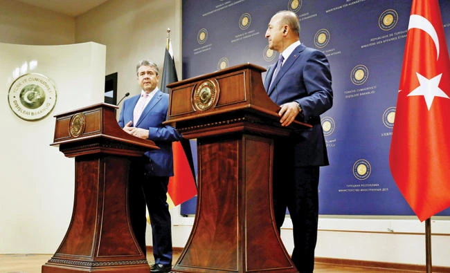 German Foreign Minister Sigmar Gabriel and his Turkish counterpart Mevlut Cavusoglu attend a news conference in Ankara on Monday. (Reuters)
