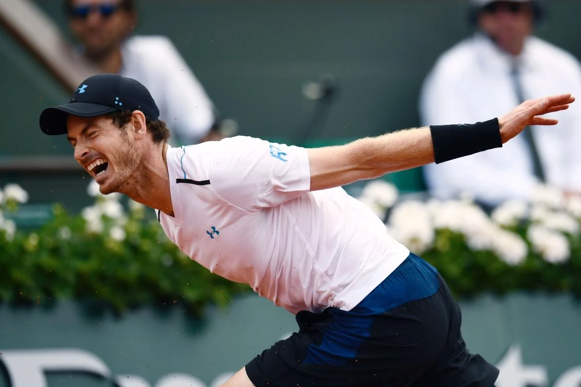 Britain's Andy Murray runs to return the ball to Russia's Karen Khachanov during their tennis match at the Roland Garros 2017 French Open on Monday in Paris. (AFP)